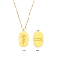 Gold oval December Poinsettia pendant necklace showing detailed front and back floral engraving - December Poinsettia