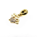 Macro shot of gold Xi character charm with pavé heart zirconia for snake chain bracelets - Double Happiness Heart Zirconia