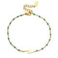 Bohemian gold chain bracelet with turquoise beads and a lightning bolt pendant charm - Gold-Turquoise Beads