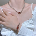Gothic silver chain jewelry set with red gemstones and small cross pendants for women - Silver And Black Necklace And Bracelet With Red Stone