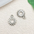 Silver sun pendants with hollow centers and radial rays for DIY jewelry making - Hollow Sun / 12x15mm