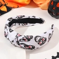 Detail of Halloween knotted headband with skull patterns and pearl rhinestone accents - Knotted Skull White Style