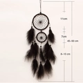 Handmade black dream catcher with feathers and beads on white background, 45-50cm long - Double Ring / Black