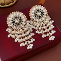 Close-up of vintage gold earrings with pearls and black gems on a red wooden box - Gold (Silver Earring Post)