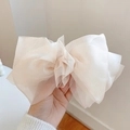 Chic cream oversized bow hair claw clip in lightweight organza for elegant styling - Bow Spring Clip / White