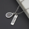 Silver stainless steel faith necklace with mustard seed drop pendant on fine chain - Faith + Teardrop