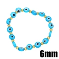 Dettaglio di un braccialetto portafortuna malocchio da 6mm con perline blu e oro - Azzurro