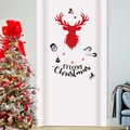 Noordse kerstmuurstickers met rendier en Merry Christmas tekst op een witte deur - Stijl PH-SD1087