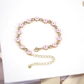 Bohemian gold evil eye bracelet with pink enamel and sparkling zircon stones - Pink