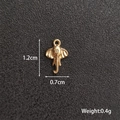 Polished gold elephant charm for DIY jewelry showing dimensions 1.2cm by 0.7cm and 0.4g weight - Elephant Trunk