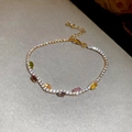 Close-up of gold tennis bracelet with white zircons and colorful marquise gemstones - No.38 Colored Marquise Zircon Bracelet-Gold-Multicolor