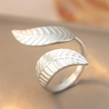 Adjustable silver leaf ring featuring detailed texture and a minimalist nature design - Double Leaf / Silver