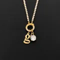 14K gold plated stainless steel necklace featuring a letter g and crystal pendant design - Letter G