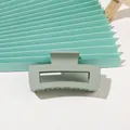 Close-up of matte green rectangular hair claw clip with hollowed structure on a clean background - Medium Matte Square - Light Army Green