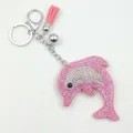 Portachiavi a delfino rosa con strass scintillanti, nappa rosa e campanellino argento - Rosa