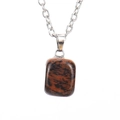 Macro detail of natural red and black jasper stone pendant on silver chain necklace - Silver Style A