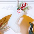White knitted Christmas stocking featuring red embroidered letter G and holly leaf detail - Letter G / White