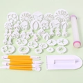 Macro detail of 33-piece fondant modeling tool set with cutters and rolling pin - 14 Styles 46 Pieces Set 03032