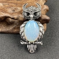 Vintage owl pendant brooch with opal gemstone and antique silver finish details - Synthetic Opalite