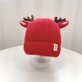 Red knit baby hat with reindeer antlers and ear flaps for warmth during winter seasons - 45-52cm / Red