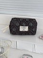 Detail of vintage corduroy makeup bag with quilted floral pattern and metal zipper - Octagonal Pouch / Dark Green