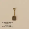 Miniature bronze alloy shovel pendant for Christmas DIY decor, 4.4cm size - No.10 - Bronze Alloy Shovel with Russian Text