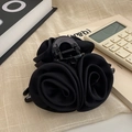 Elegant black satin rose hair claw clip for women on a minimalist cream linen background - Black