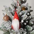 Detail of red knitted Christmas gnome hanging on a snowy tree with golden ornaments - C3-1 Red Small Hanging Ornament Style A (Red Snowflake Knitted Hat)
