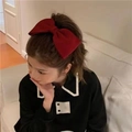 Elegant large red bow hair clip with pearls worn on high ponytail hairstyle - Black Bow Spring Clip