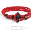 Detail of red handmade braided milan line bracelet with black sea turtle fastener - Black Sea Turtle Buckle / Red Cord Sea Turtle
