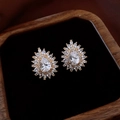 Golden stud earrings with teardrop stone and crystal halo in a luxury wooden gift box - Halo Teardrop / Gold