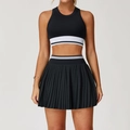Two-piece black athletic set with striped band high waist pleated skirt and crop top - Premium Black / S