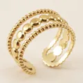 Detailed close-up of a three-layer gold stainless steel ring with beaded and disc textures - Three Layer Beaded Disk Style (ZR033G) / Gold