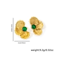 Detail view showing gold floral earrings with green stones and dimensions 3cm by 2cm - Green Gemstone Style / Green