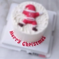 Figurine de Père Noël en PVC souple sur gâteau à la crème avec inscription Merry Christmas - Lettre Joyeux Noël