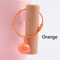 Orange painted metal bell charm with matching plastic coated wire ring keychain - Orange