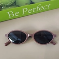 Kids trendy oval sunglasses with deep purple frames and dark protective lenses - Purple