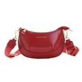 Red crescent crossbody bag with wide fabric strap and golden fashion bag text - Red