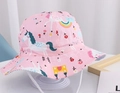 Pink kids bucket hat with unicorn and rainbow prints featuring a white chin strap - 50 Pink Pony / 54cm