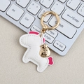 White leather pony keychain with hot pink mane and golden money bag charm pendant - Mini / White