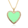 Detail showing mint green heart pendant with pavé cubic zirconia on golden chain - Mint Green Style (F151)