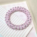 Pink spiral hair tie with black butterfly print on a decorative card for styling - Butterfly