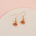 Handcrafted Halloween pumpkin dangle earrings with orange enamel and gold finish hooks - Smiling Pumpkin