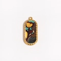 Macro detail of oval gold-plated pendant with colorful enamel floral pattern and beads - Dark Floral Abstract (Style 5)