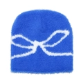 Detailed plush texture of Klein blue beanie featuring a white bow jacquard pattern - M (56-58cm) / Sapphire Blue