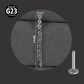 Macro view of G23 titanium labret stud with zircon top and long tassel chain detail - Triple Zirconia Long Tassel Dangle / Steel Color (NO-3)