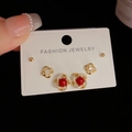Three-piece Korean earring set with red gemstone floral studs and gold finish - Gold-Rotating Red Pearl Set (28#)