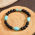 Vintage elastic beaded bracelet with matte black beads, turquoise stones, and gold accents - ZJ14944-Matte Black Bead Irregular Turquoise Gold Spacer Bracelet