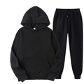 Detail view of black oversized hooded tracksuit with drawstring waist and ribbed cuffs - Black Top and Black Pants