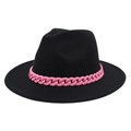 Detail of a black jazz fedora featuring a bold pink acrylic chunky chain accessory - Black